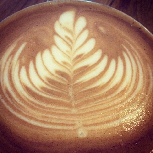 latte art - made at quest coffee roasters